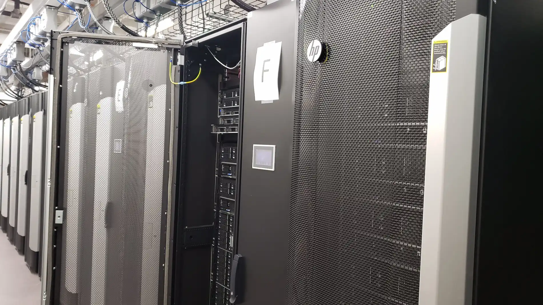 A data center with a row of nanofab servers.